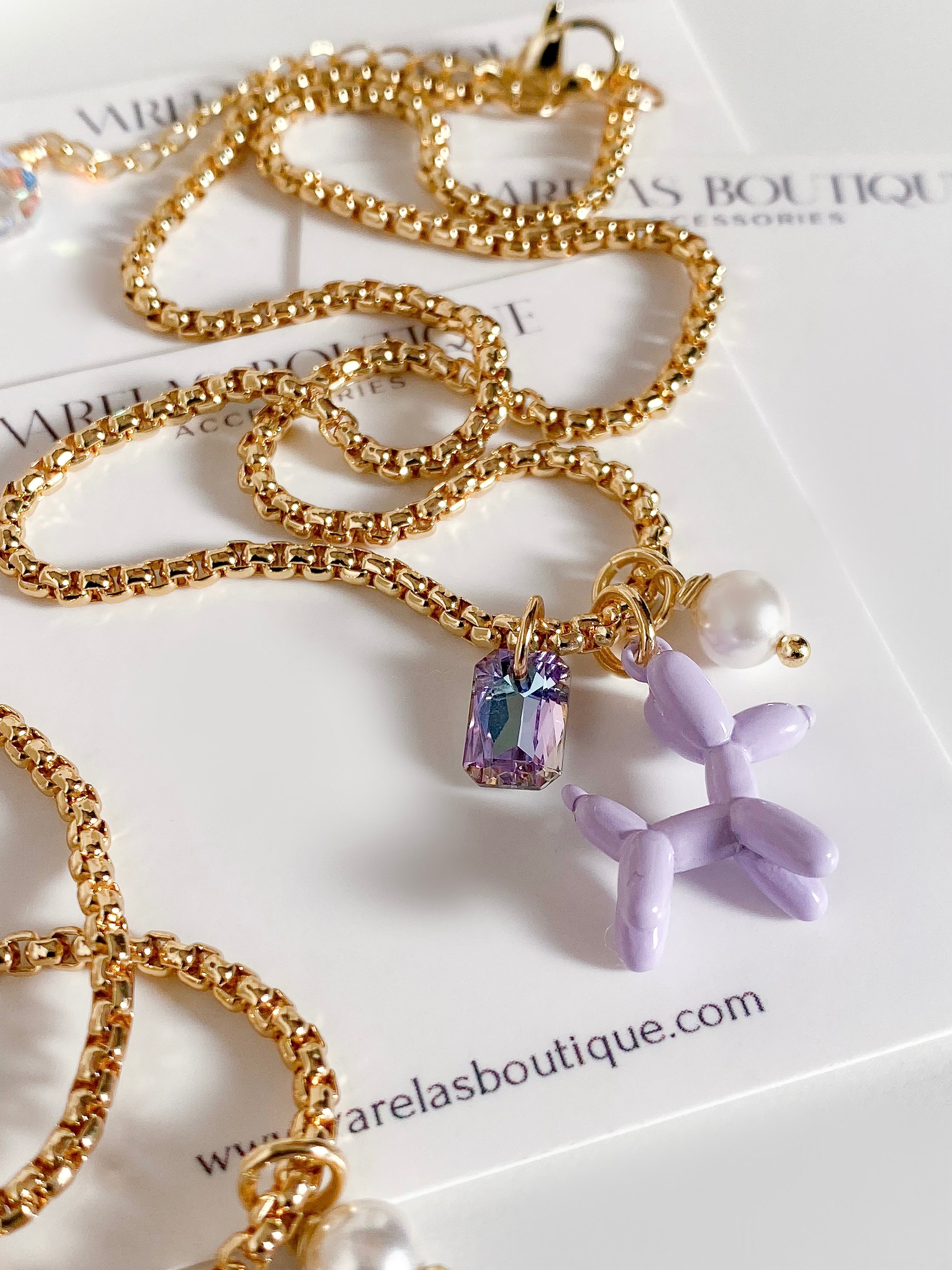 Purple balloon dog necklace